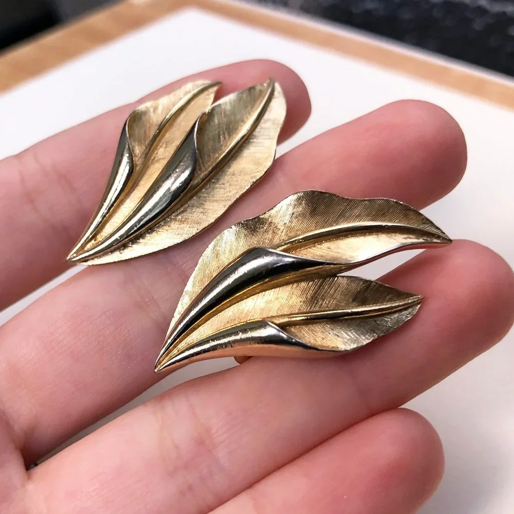 Gold leaf earrings clip on, signed Crown Trifari matt gold tone leaves earrings